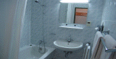 hotel
                  apartments pension schnbrunn vienna bathroom with
                  shower or bath tub hairdryer